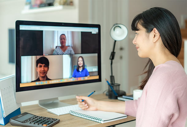 photo: woman on video call with colleagues (iStockphoto)