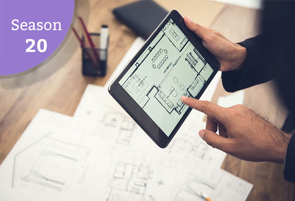 photo: examining a floor plan (iStockphoto)