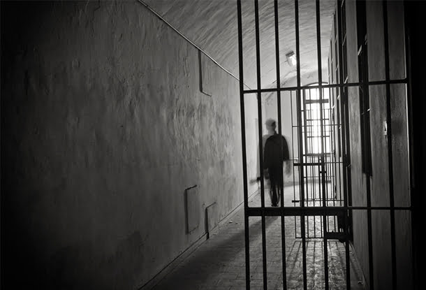 photo: shadow figure with prison bars (iStockphoto)