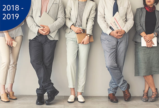 image: Legs of applicants waiting for interview (iStockphoto)