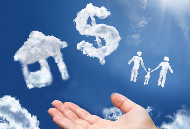 hand with clouds shaped like house, dollar sign and family (iStockphoto)