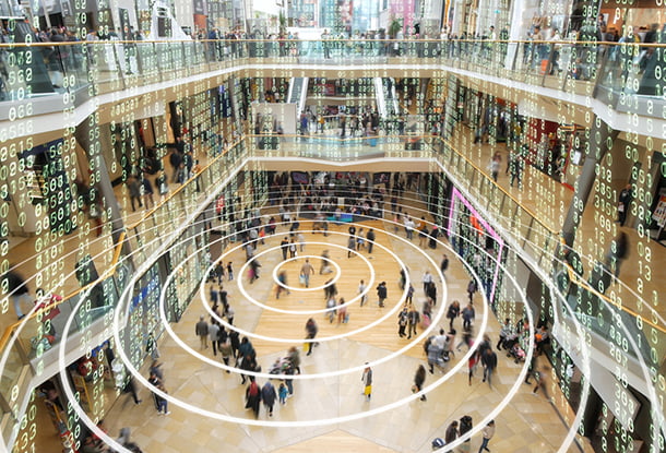 Phone sending out a signal in a matrix styled shopping mall - iStockphoto