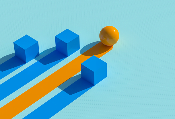 image: sphere racing ahead of cubes (iStockphoto)