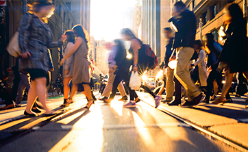 photo: figures crossing street in Toronto