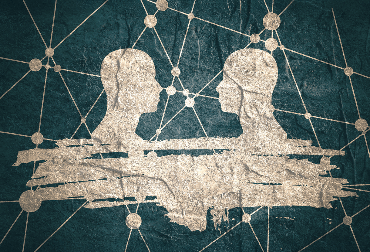 image: silhouetted heads facing each other, communication concept (iStockphoto)