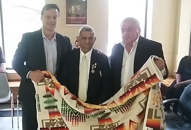 photo: Dr. Shah with blanet