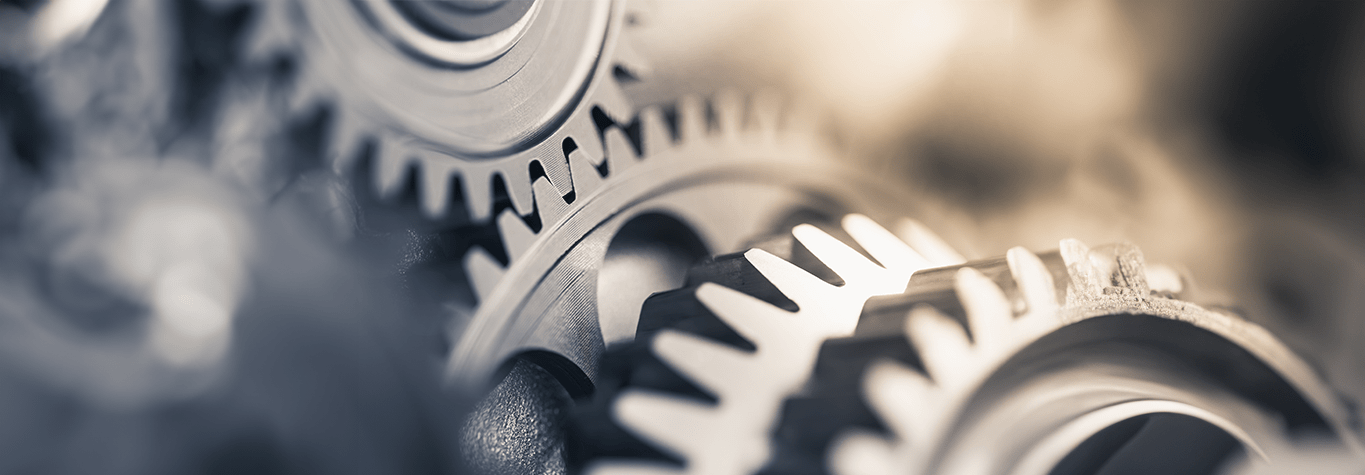 image: large gears intersecting (iStockphoto)
